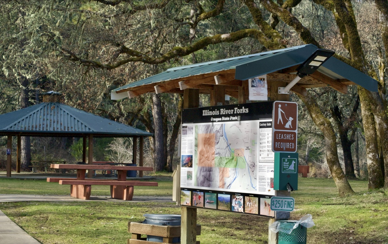 Illinois River Forks information sign with a map of all the hiking trails in the area.