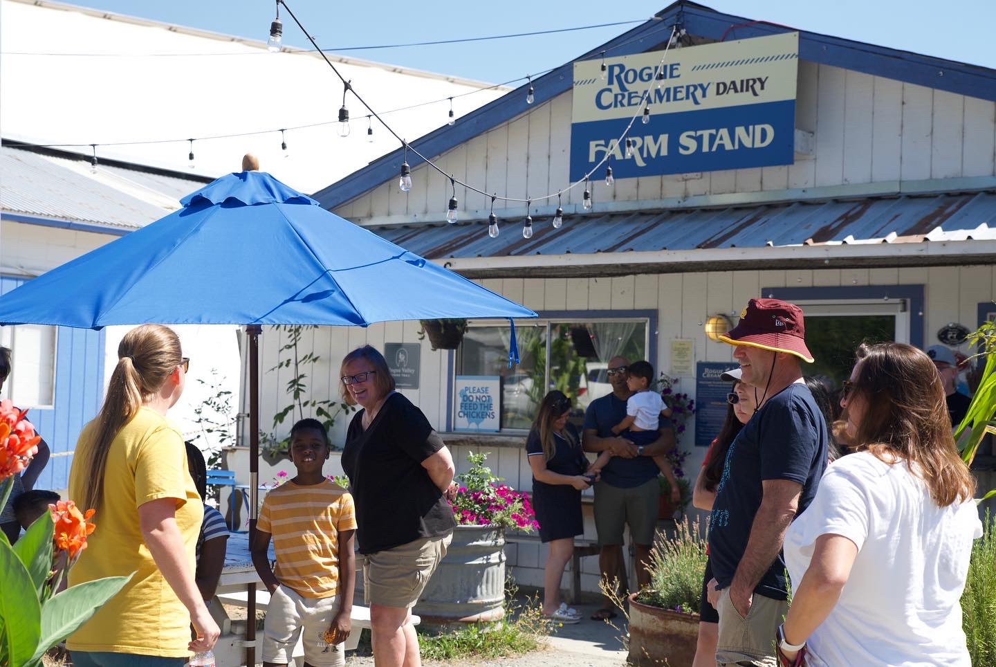 busy storefront at Rogue Creamery as people line up