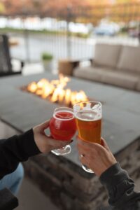 Growler Guys beer cheer by fire pit