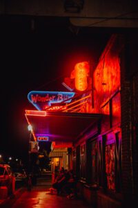 Wonder Bur neon sign lit up at night street view