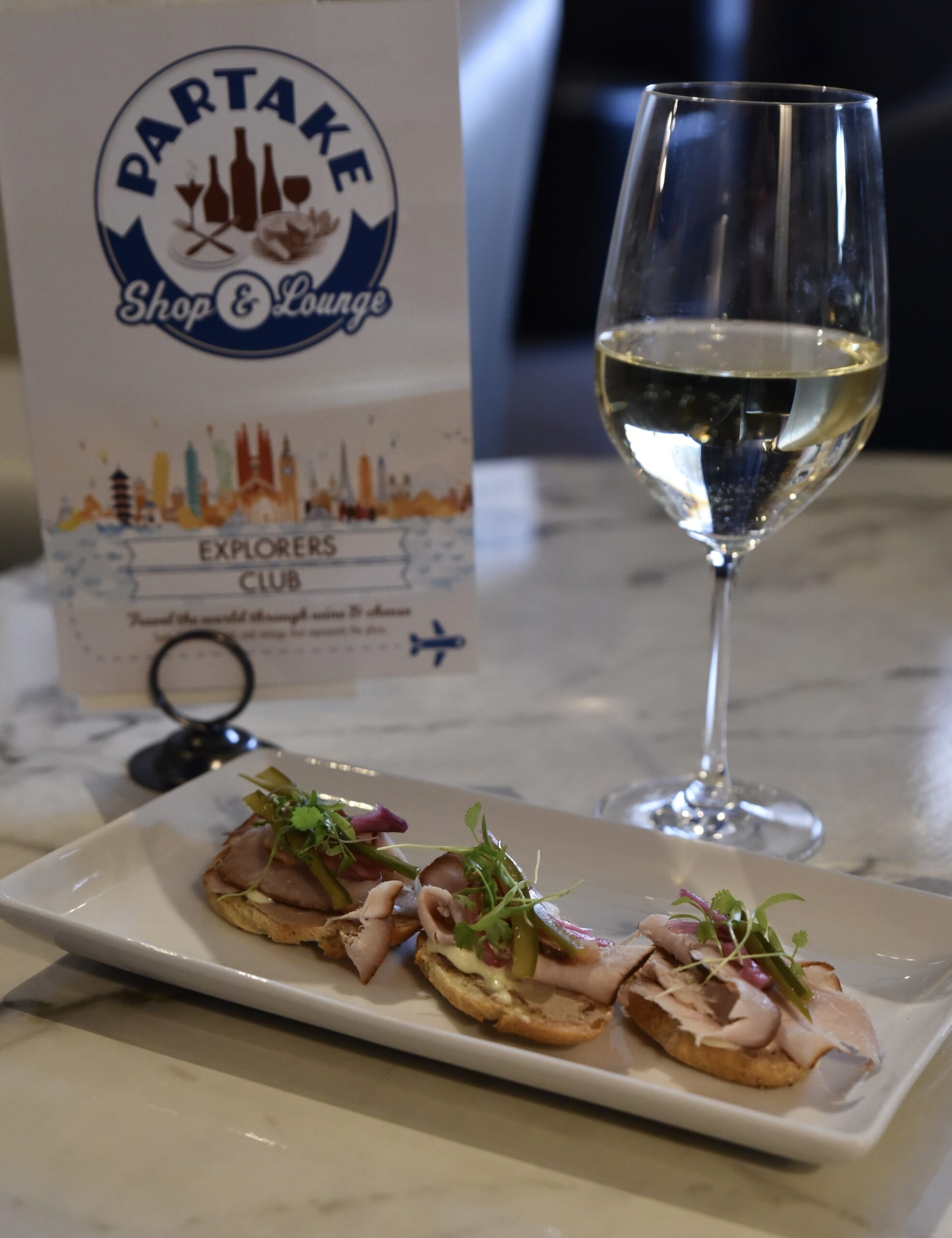 Partake wine fine dining champagne and appetizer