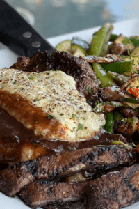Twisted Cork fine dining close up of crispy steak and vegetables
